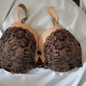 Nude and black lace bra